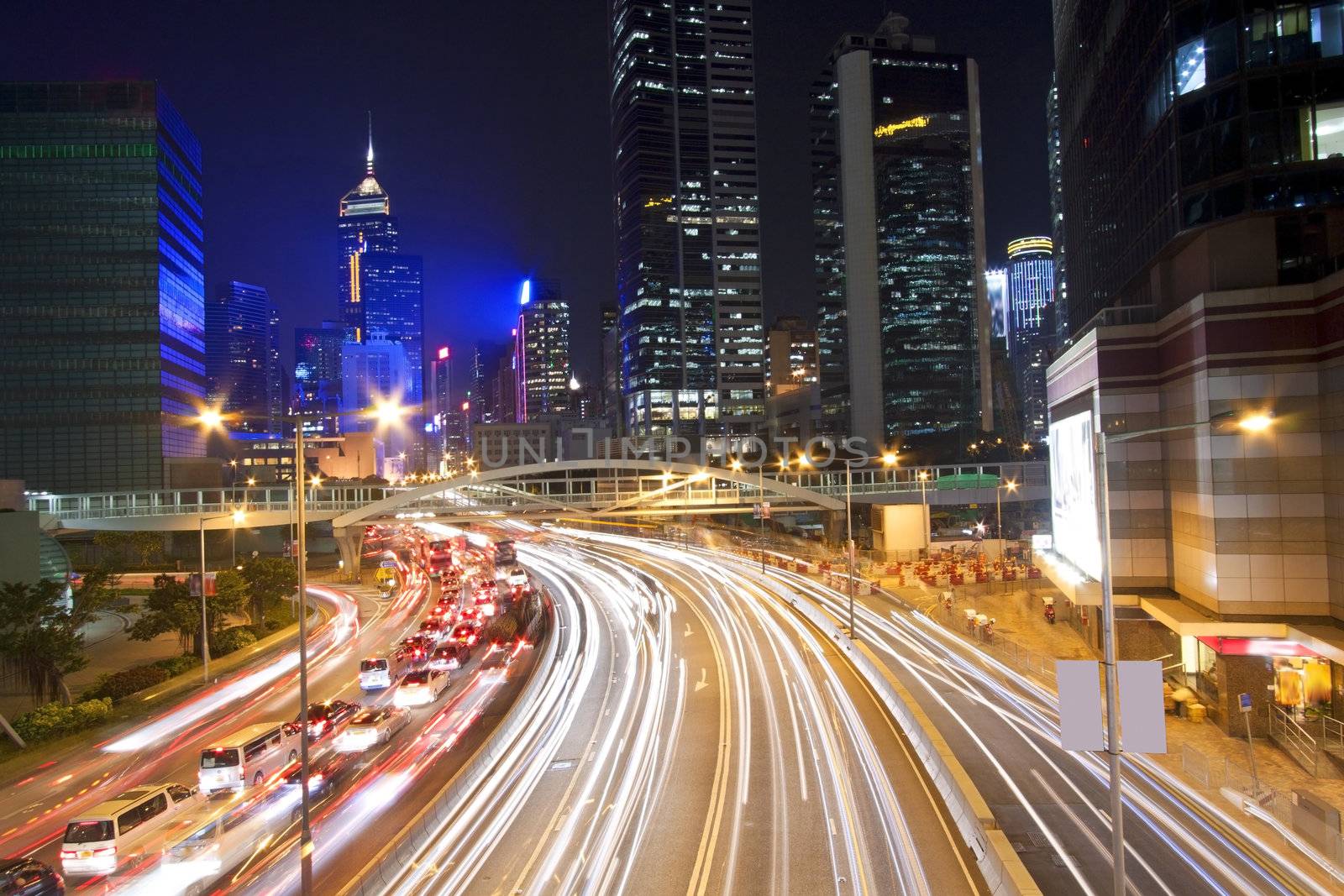 Traffic in Hong Kong downtown at night by kawing921