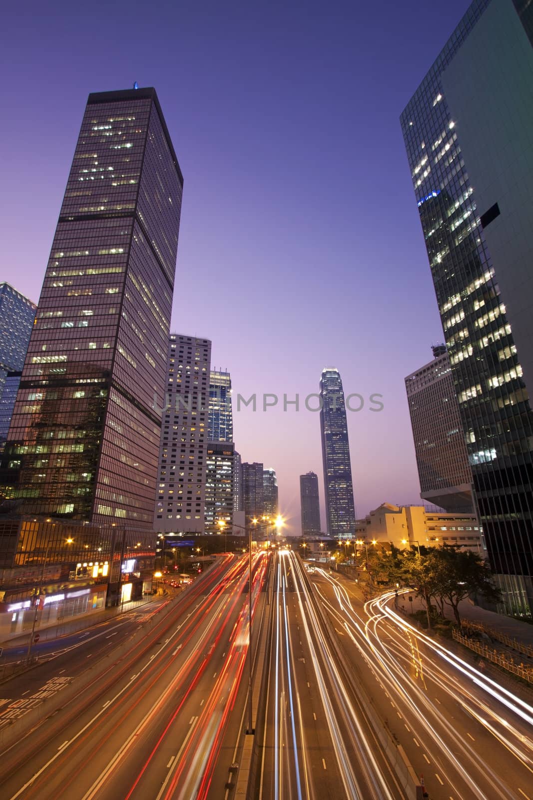 Traffic in Hong Kong downtown at sunset time by kawing921