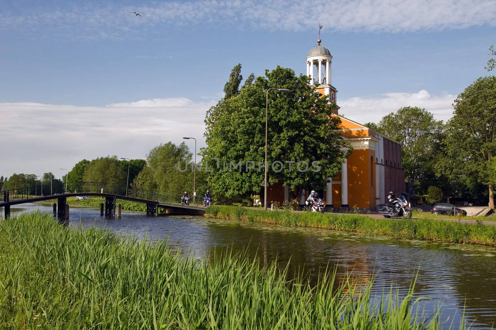 Church, bridge and country road by Colette