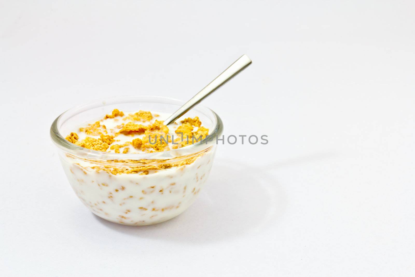 Corn flakes and milk in a bowl-healthy light breakfast