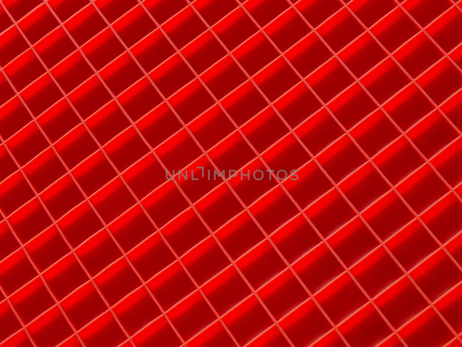 close up of red squares diagonal background