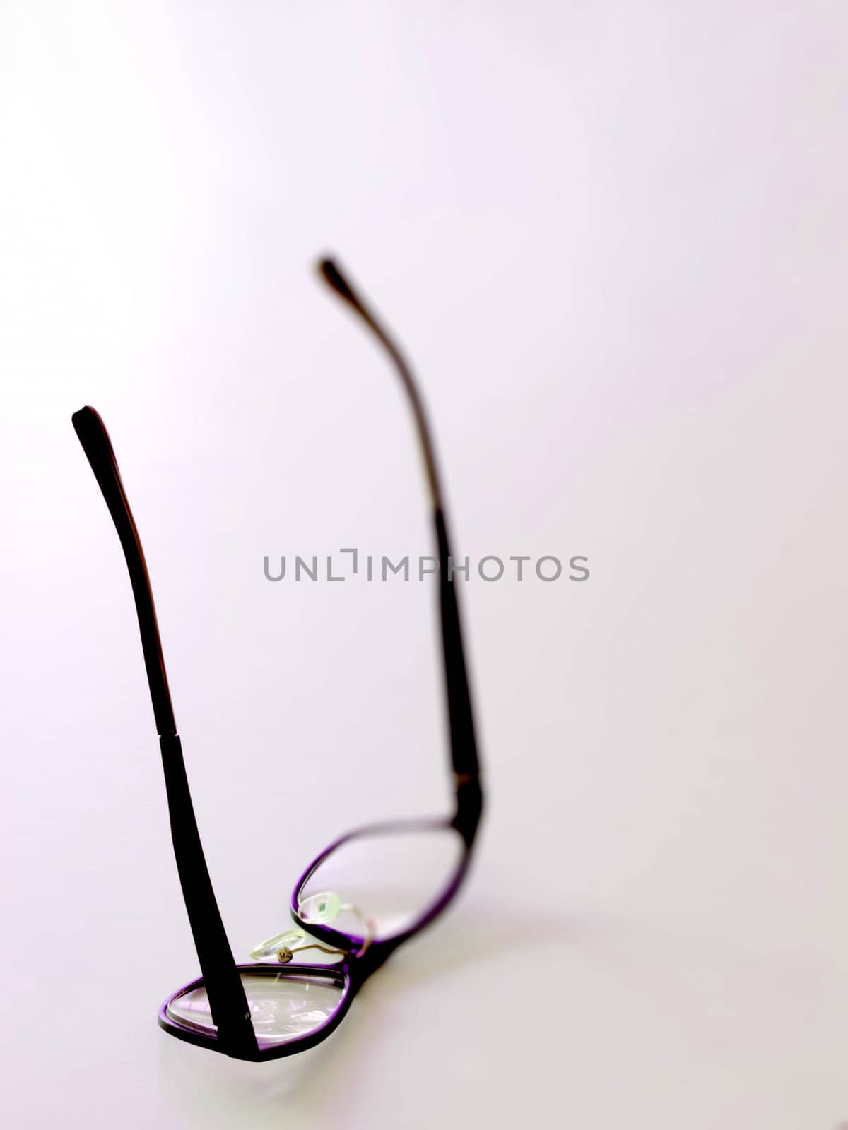 close up of fallen eye glasses