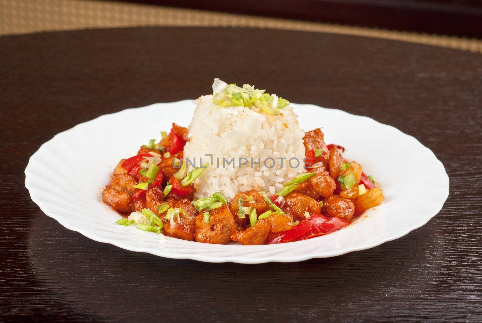 Pork meat and vegetables and pineapple with japanese rice