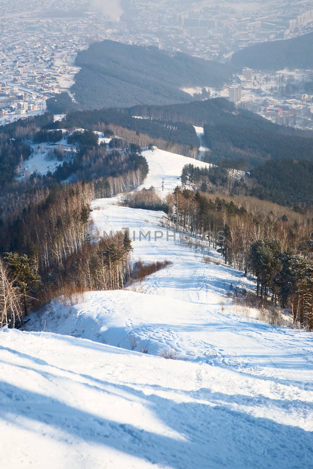 Aerial view to belokurikha resort. (From Tserkovka mountain), ski track