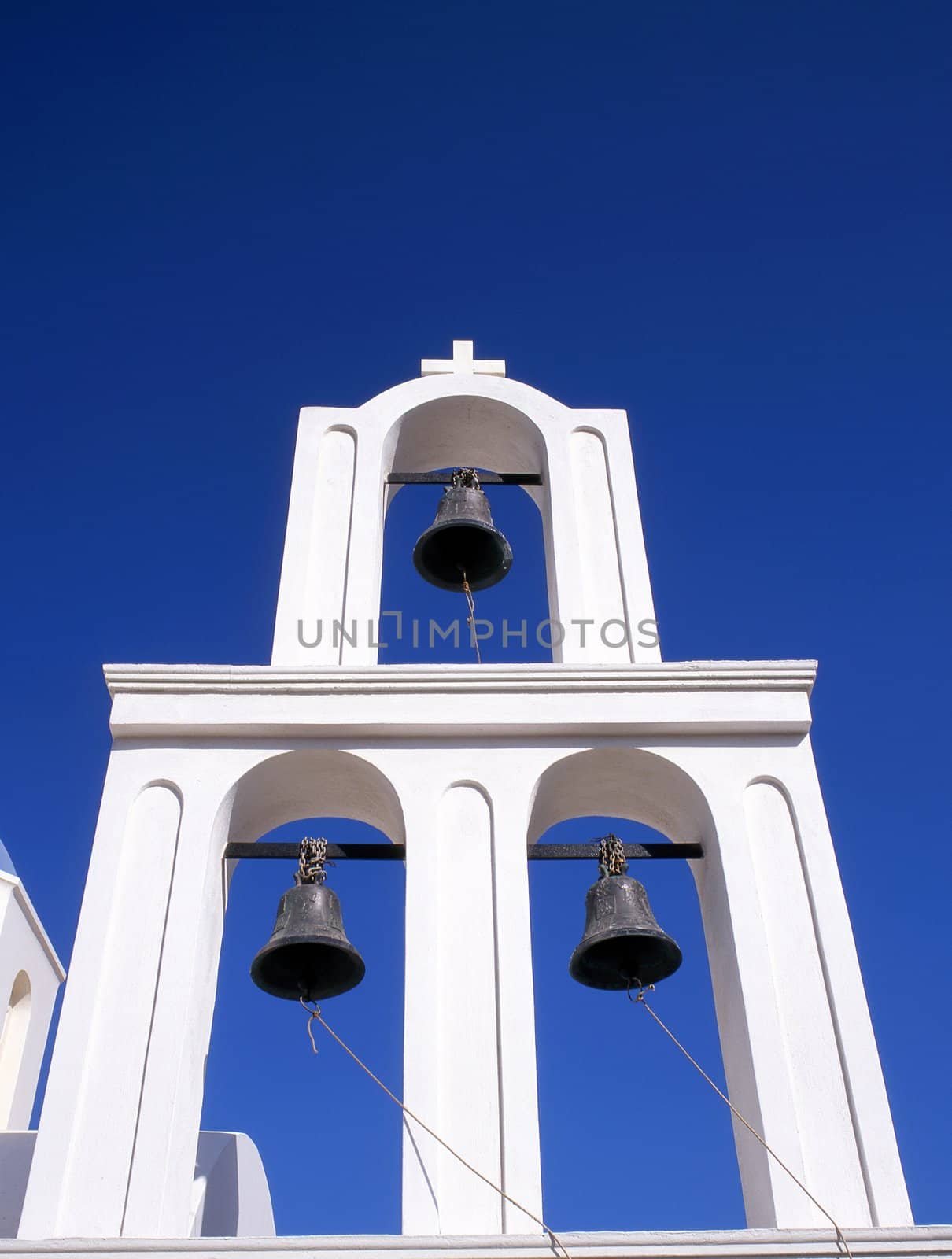 Three church bells on a greek bell tower