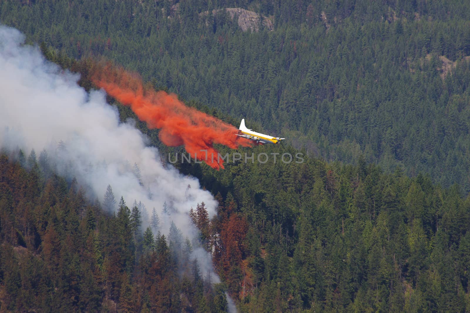 Forest fire fighting in the mountains using an aircraft