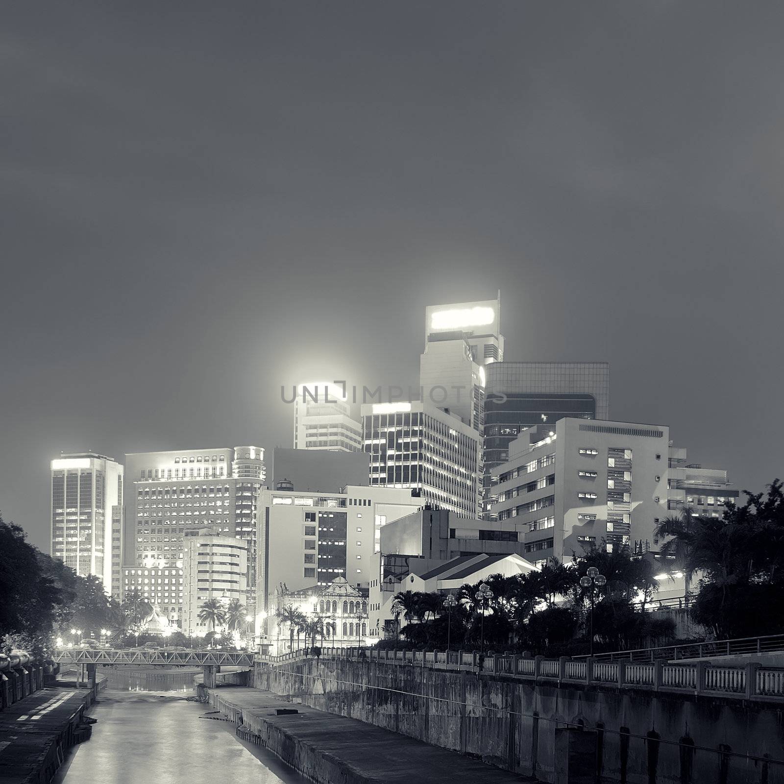 Cityscape in night with buildings in Kuala Lumpur, Malaysia, Asia.