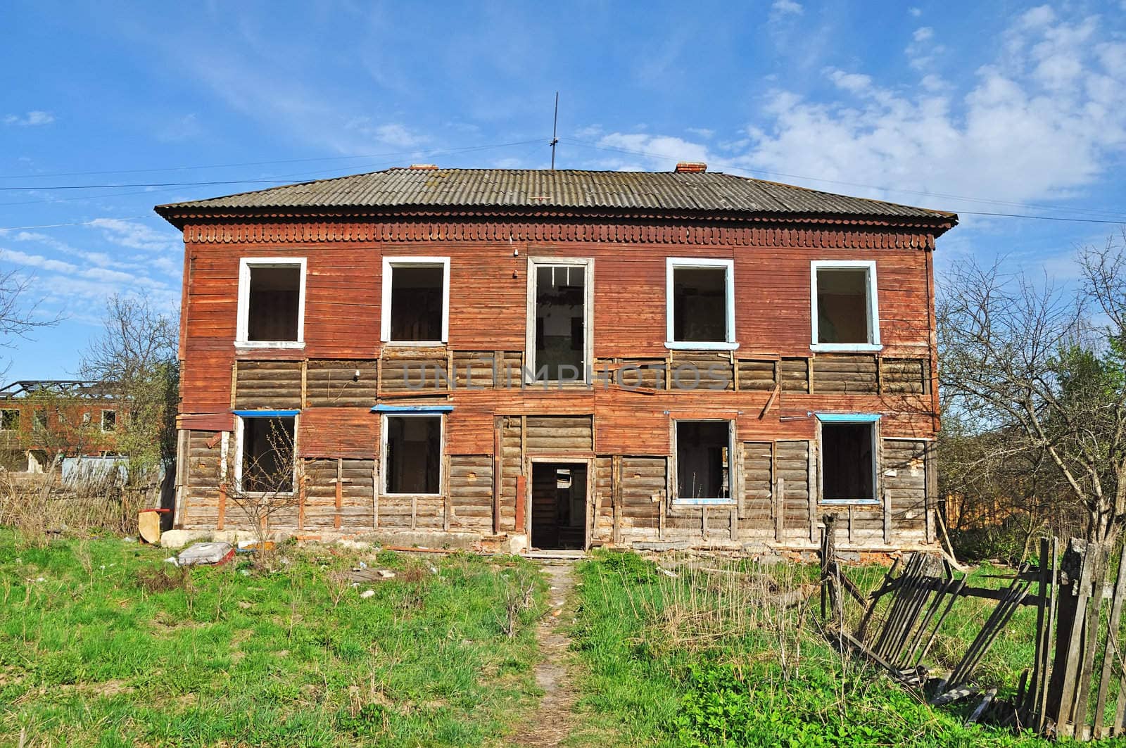 Facade of old destroyed wooden house