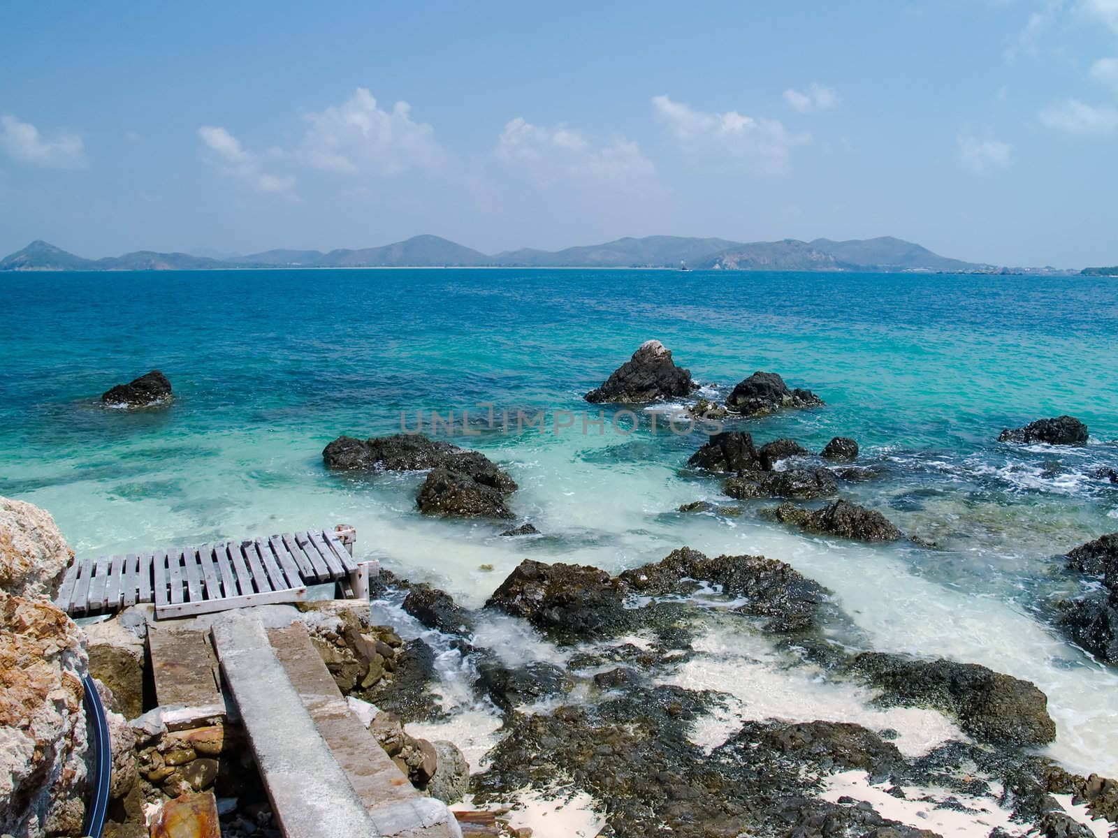 Seaside wood bridge in Ko Kham island, Sattahip, Chon Buri, Thailand