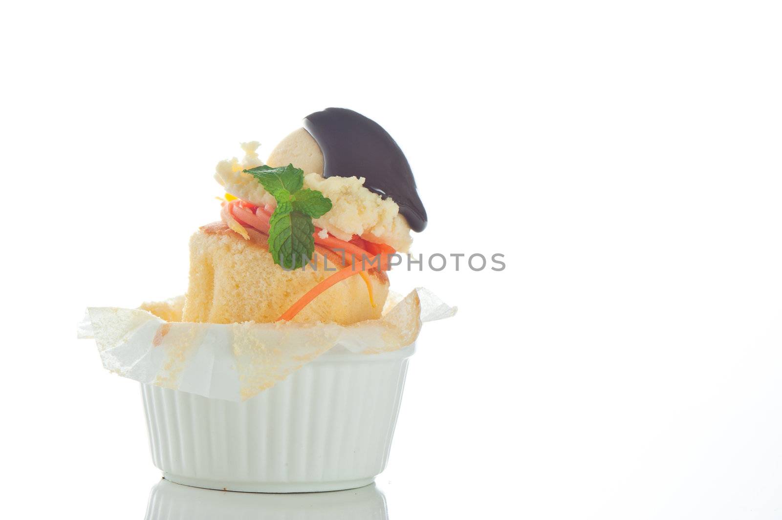 Cake with ice cream and chocolate in a rameki