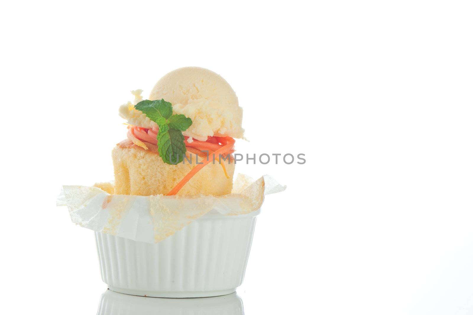 Cake with ice cream in a rameki