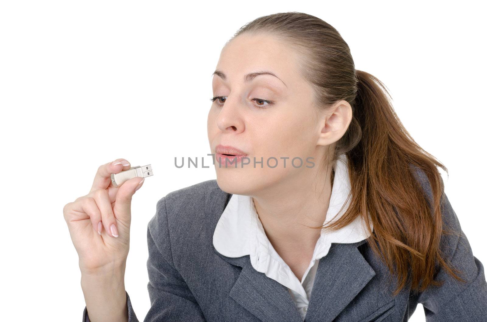 office manager, a woman closely examining USB flash drive