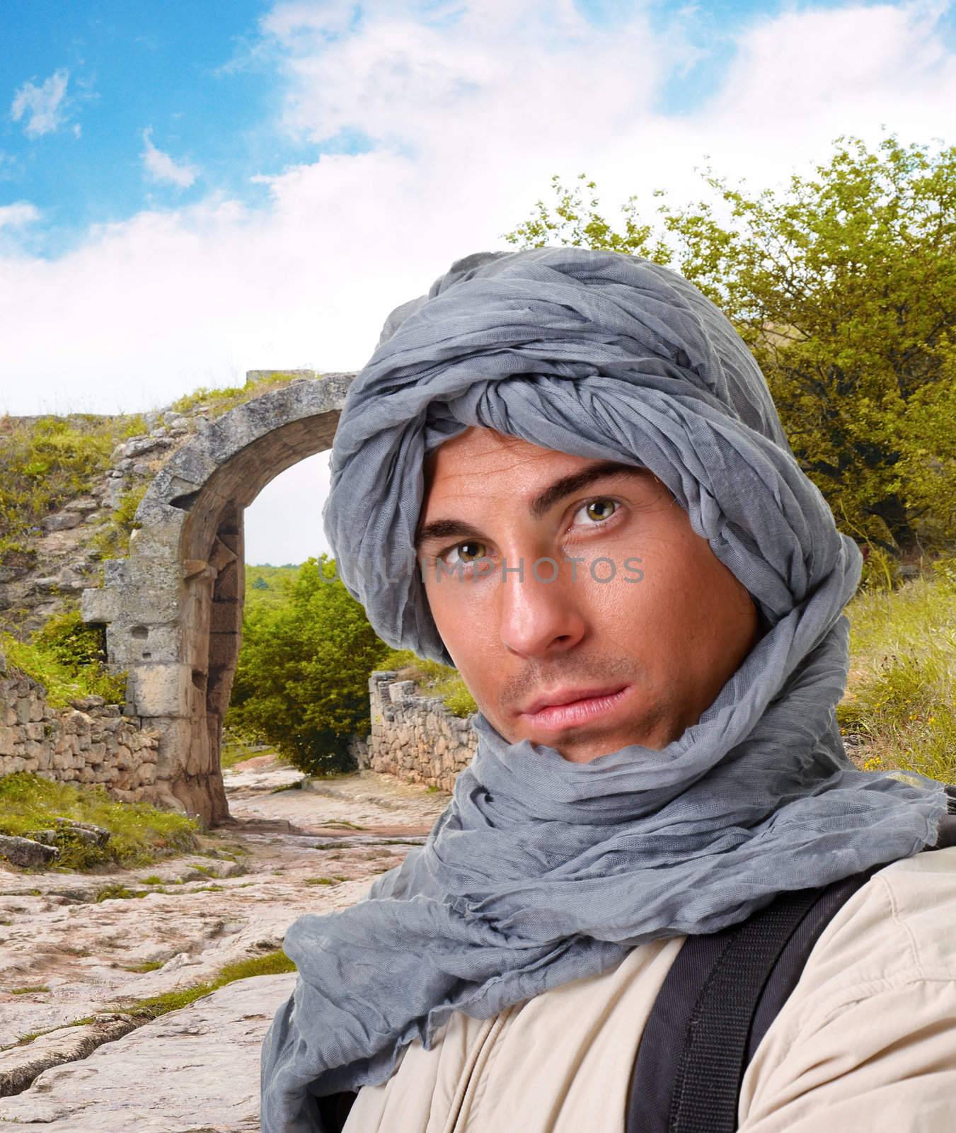 tourist hiding his head under a shawl by Sergieiev