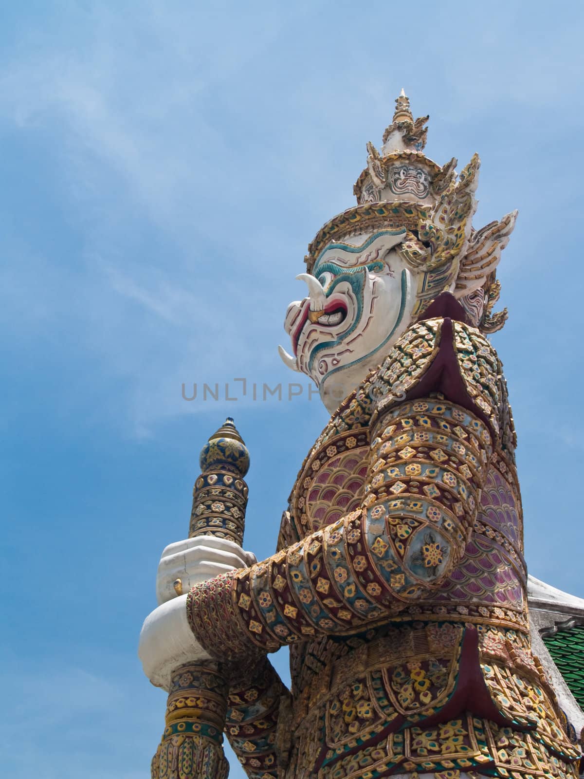 Statues of mythological giant in front of Galleries in Temple of The Emerald Buddha (Wat Phra Kaew), Bangkok, Thailand