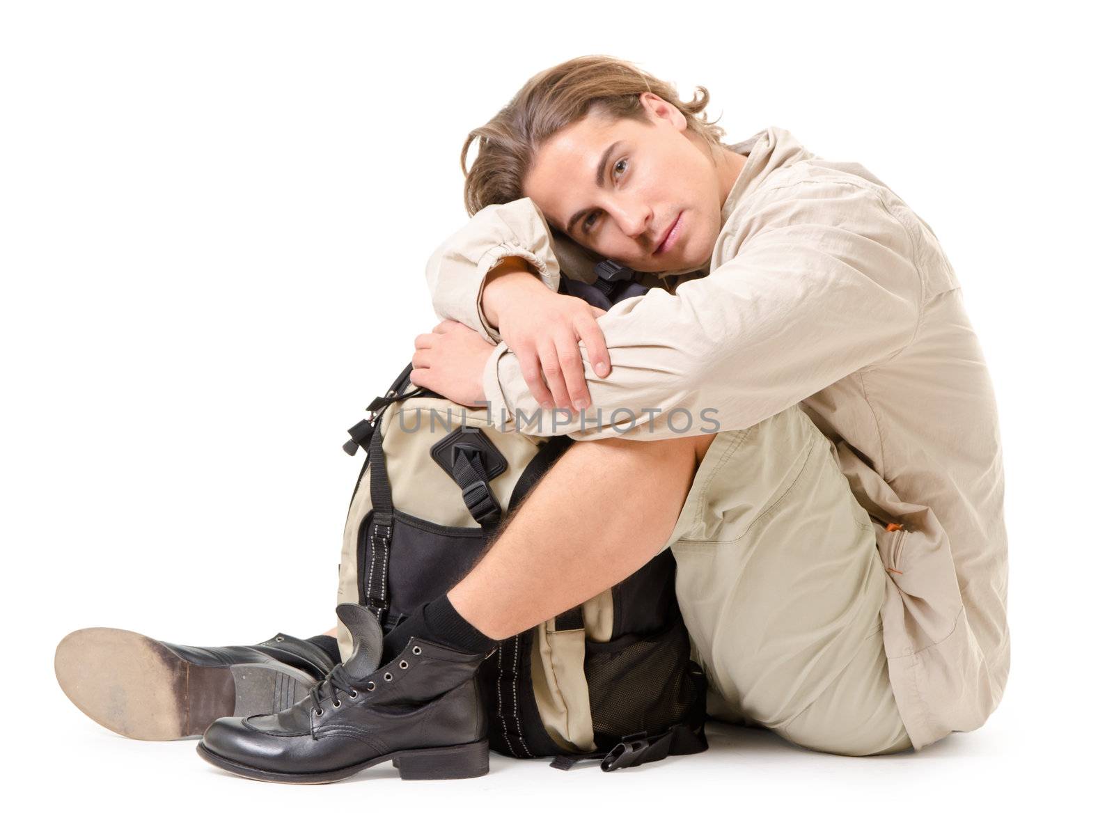 young man - tourist with backpack on a white background