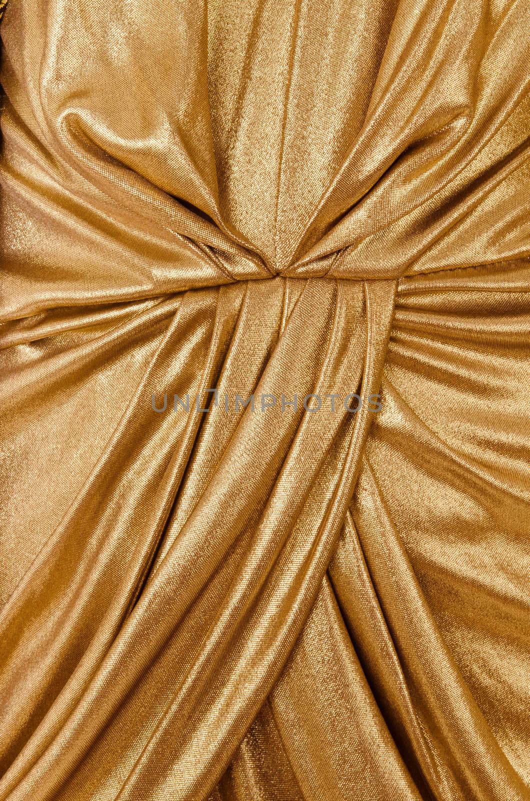 folds gold fabric closeup