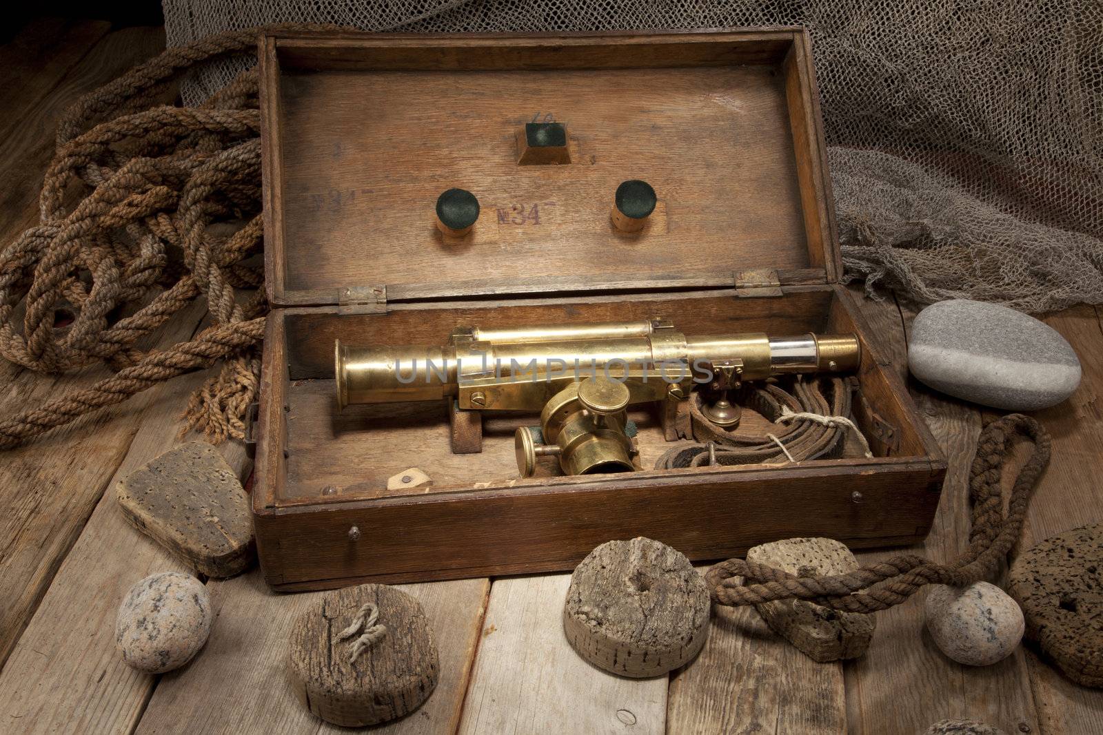 Antique telescope in wooden box