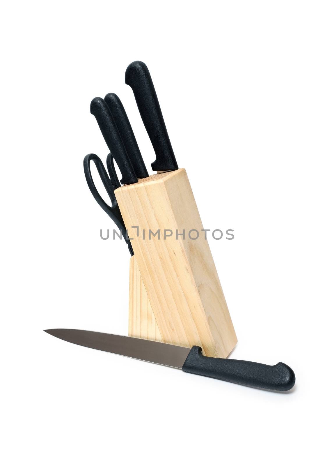 Kitchen knives set in the wooden block. Isolated on white with clipping path