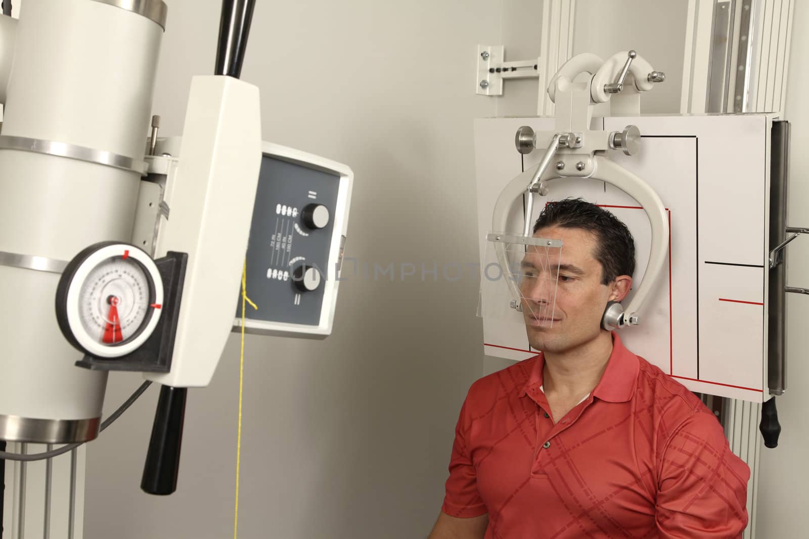 A patient getting his head x-rayed