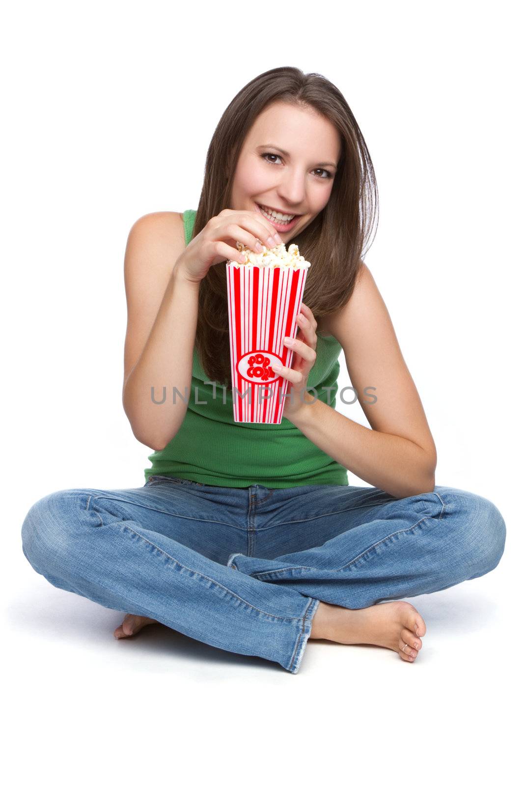 Pretty teen girl eating popcorn