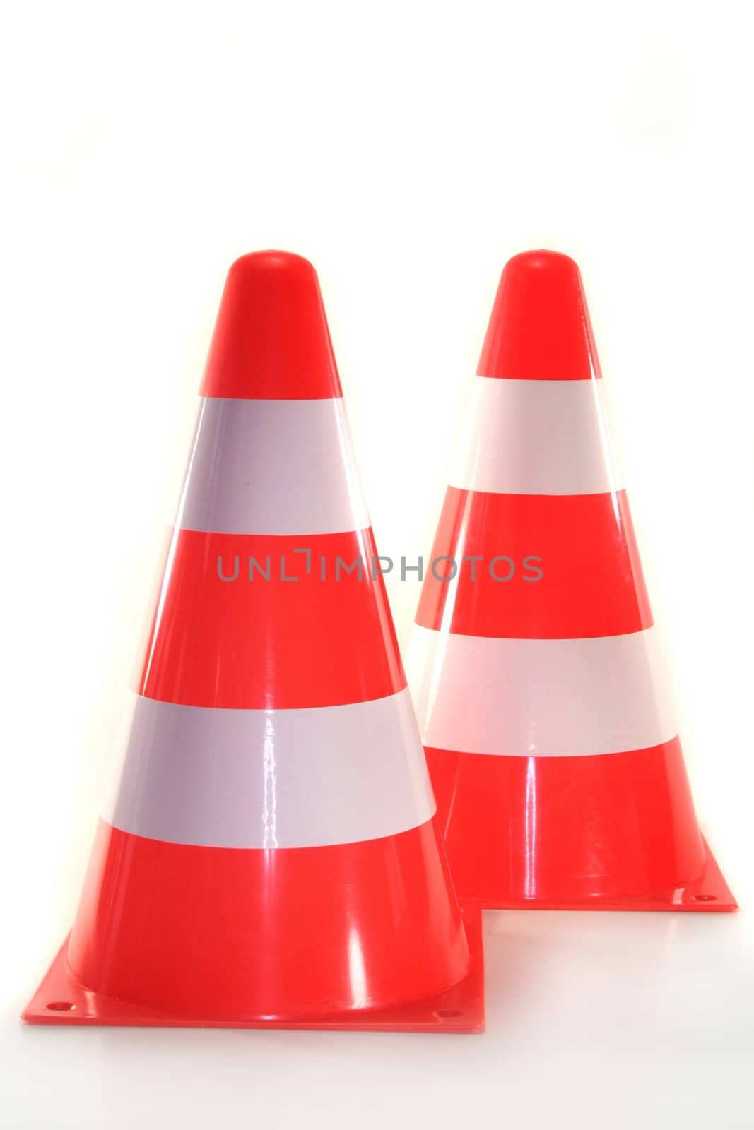 two pylons in front of white background