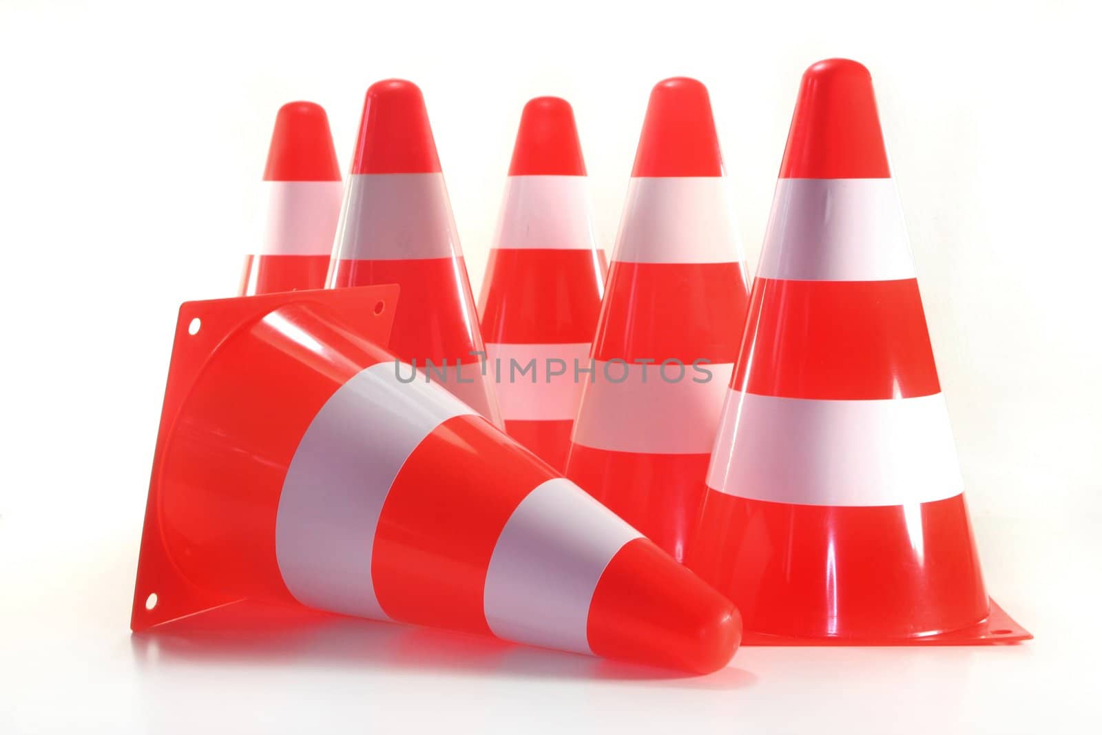 some pylons in front of white background