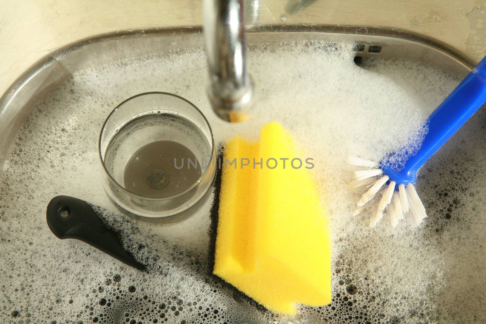 doing the dishes cleaning dirty dishes ...........