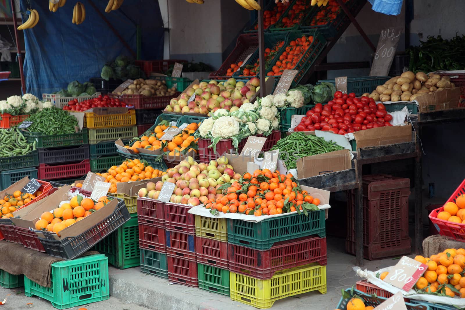 Fresh fruits and vegetables on a traditional market, El-Jem, Tunisia by atlas