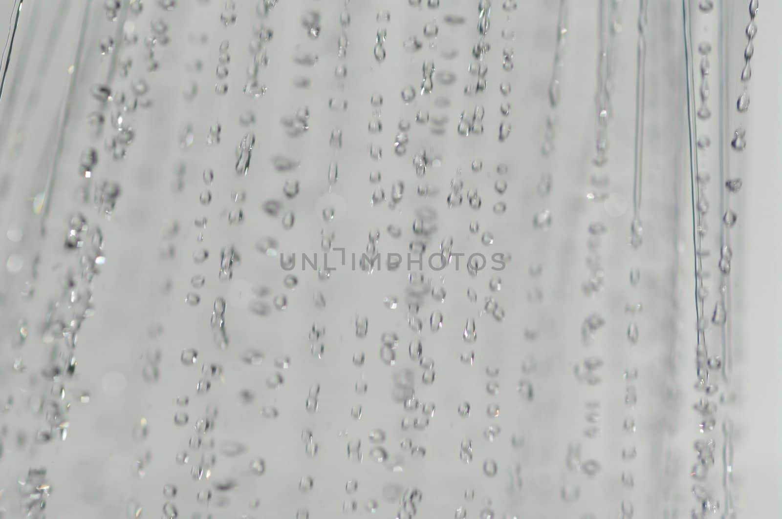 water drops falling from a shower indoors