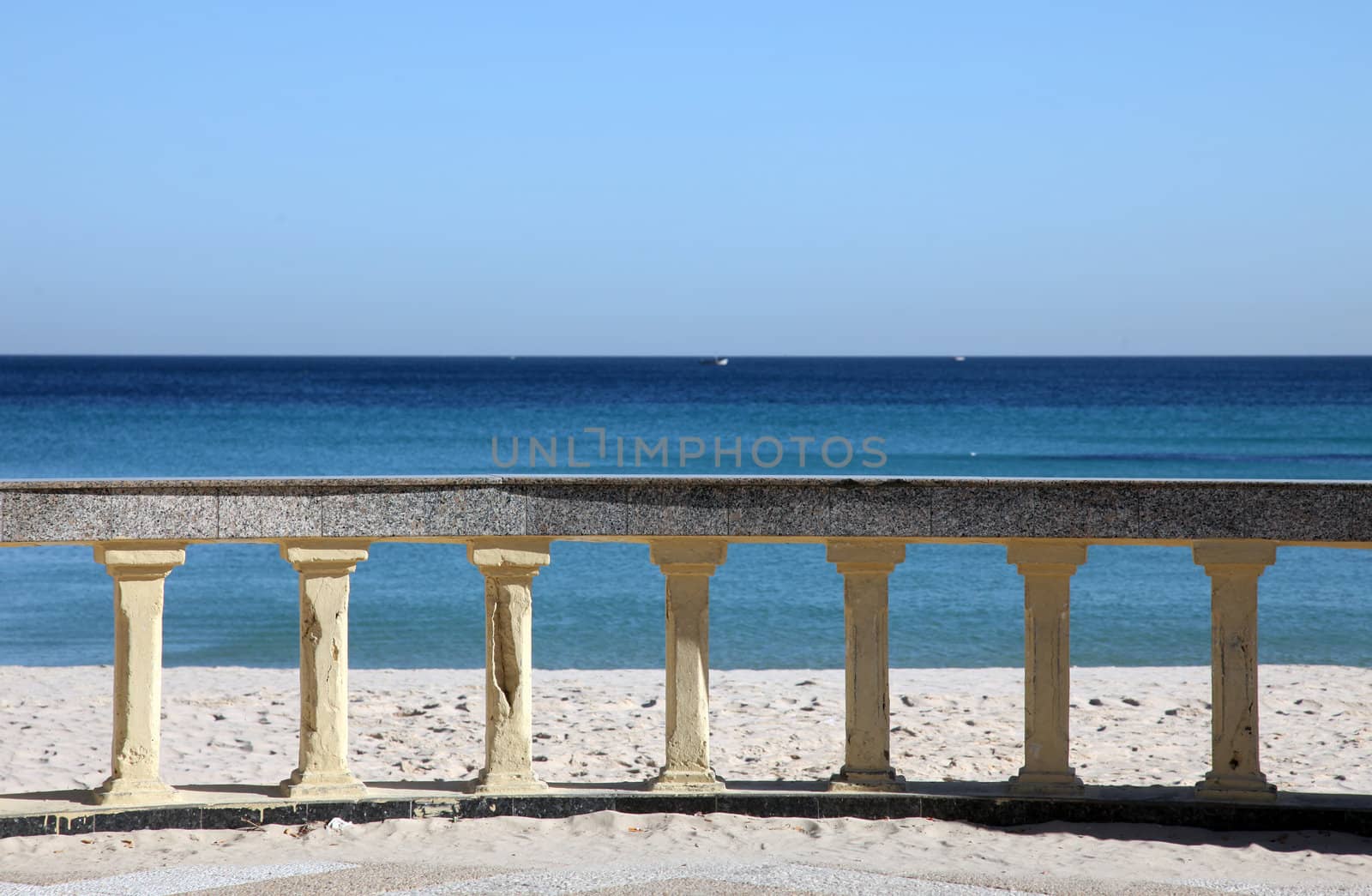 Promenade and beach of traditional seaside resort of Sousse, Tunisia by atlas