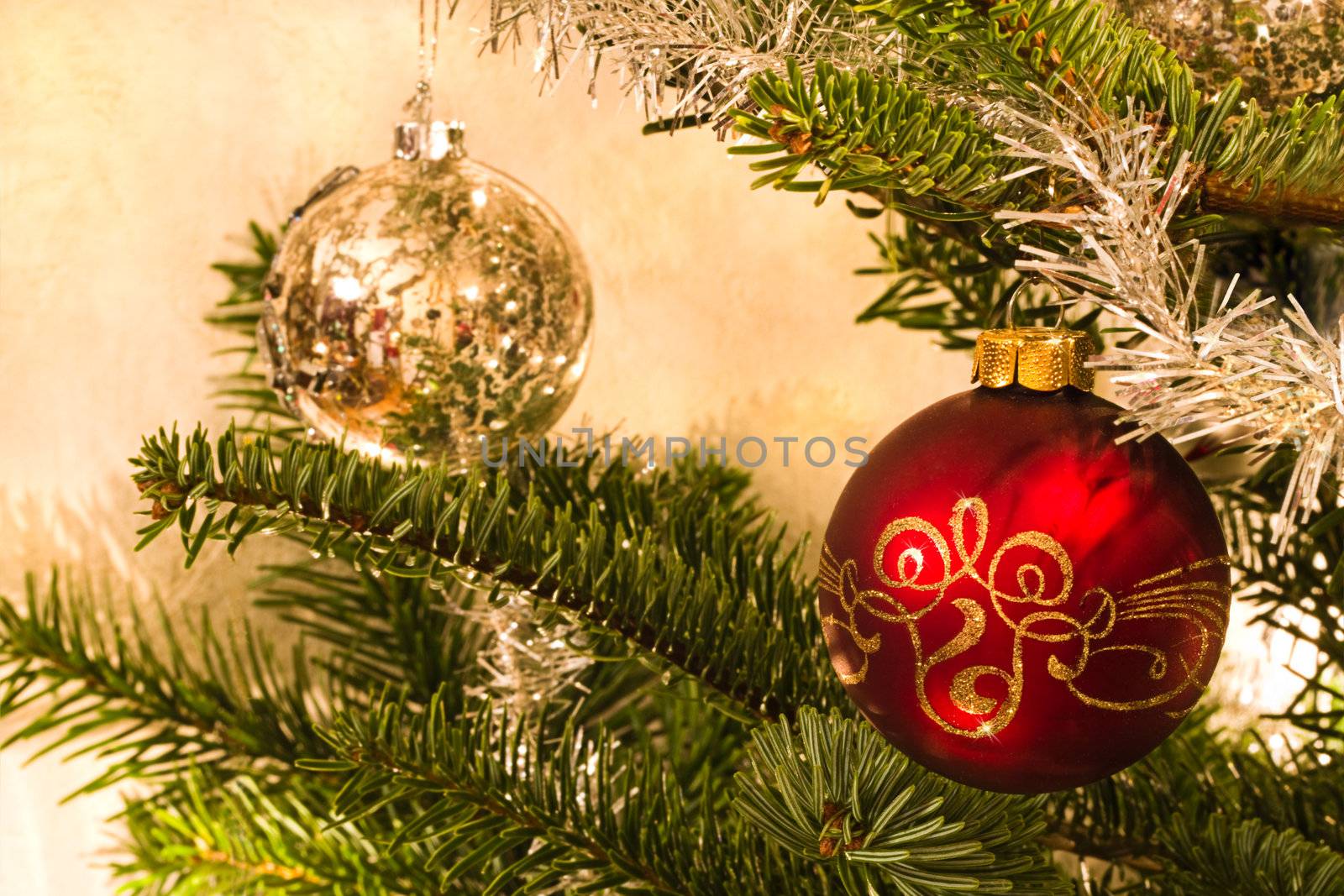 Red and silver balls in christmas tree - horizontal image