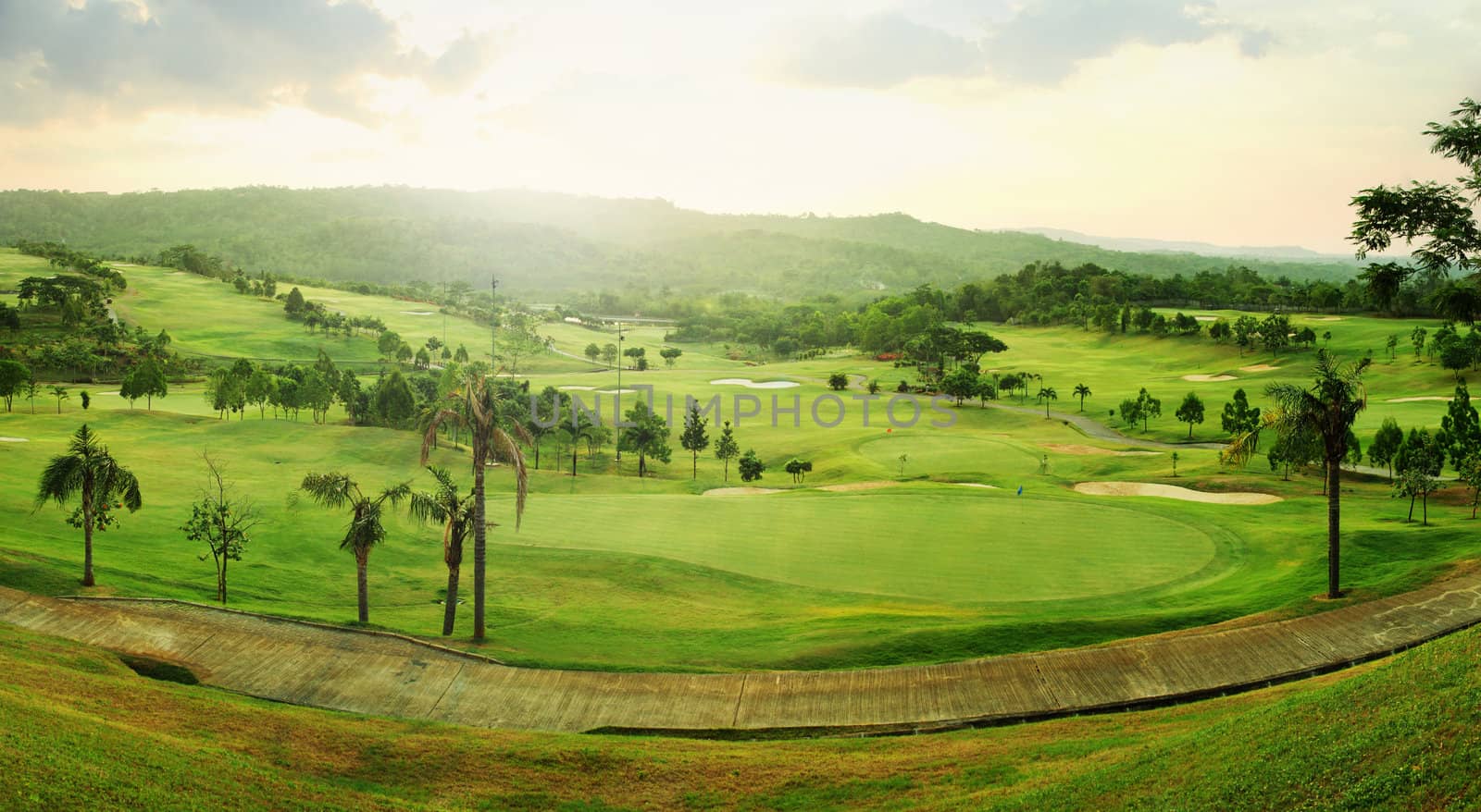 Beautiful panorama golf course at sunrise