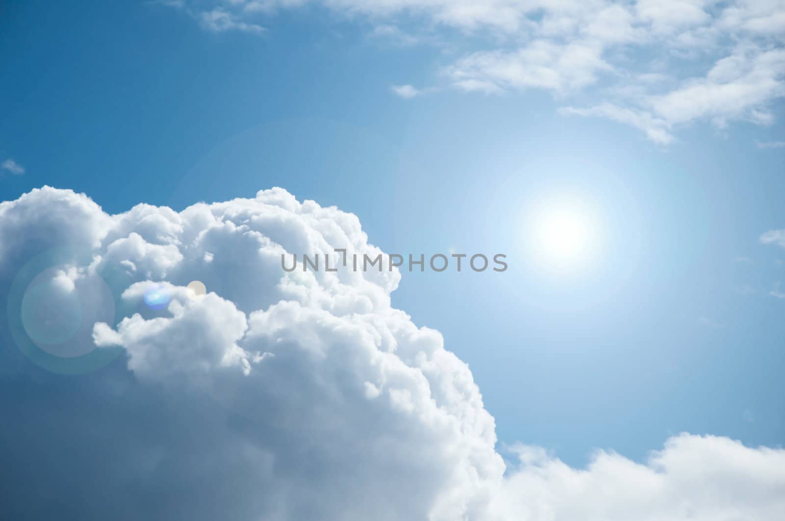 white clouds, blue sky and sun shine