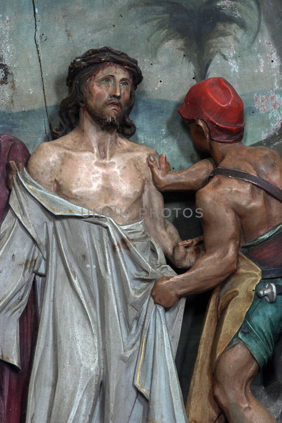 Jesus is stripped of His garments by atlas