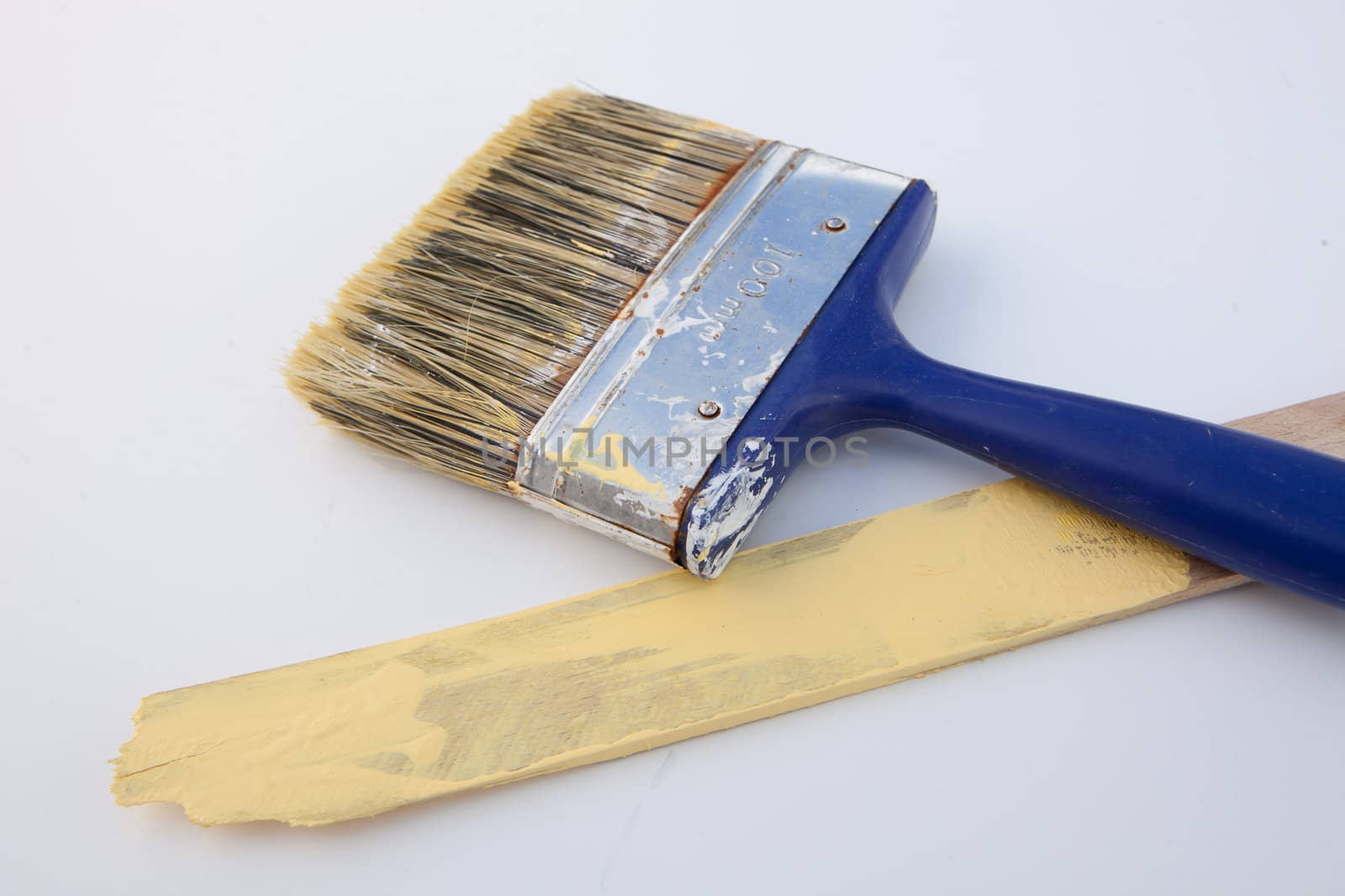 Used 100mm paint brush and yellow stiring stick