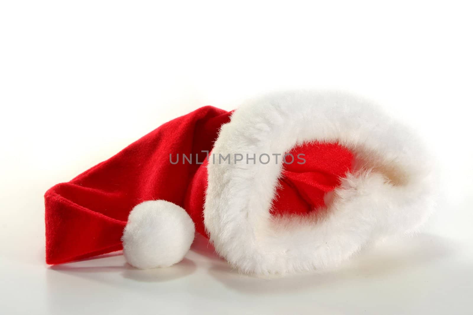 a Santa Claus hat on a light background
