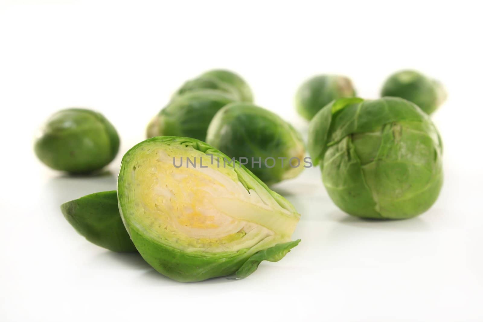 fresh, raw Brussels sprouts on white background
