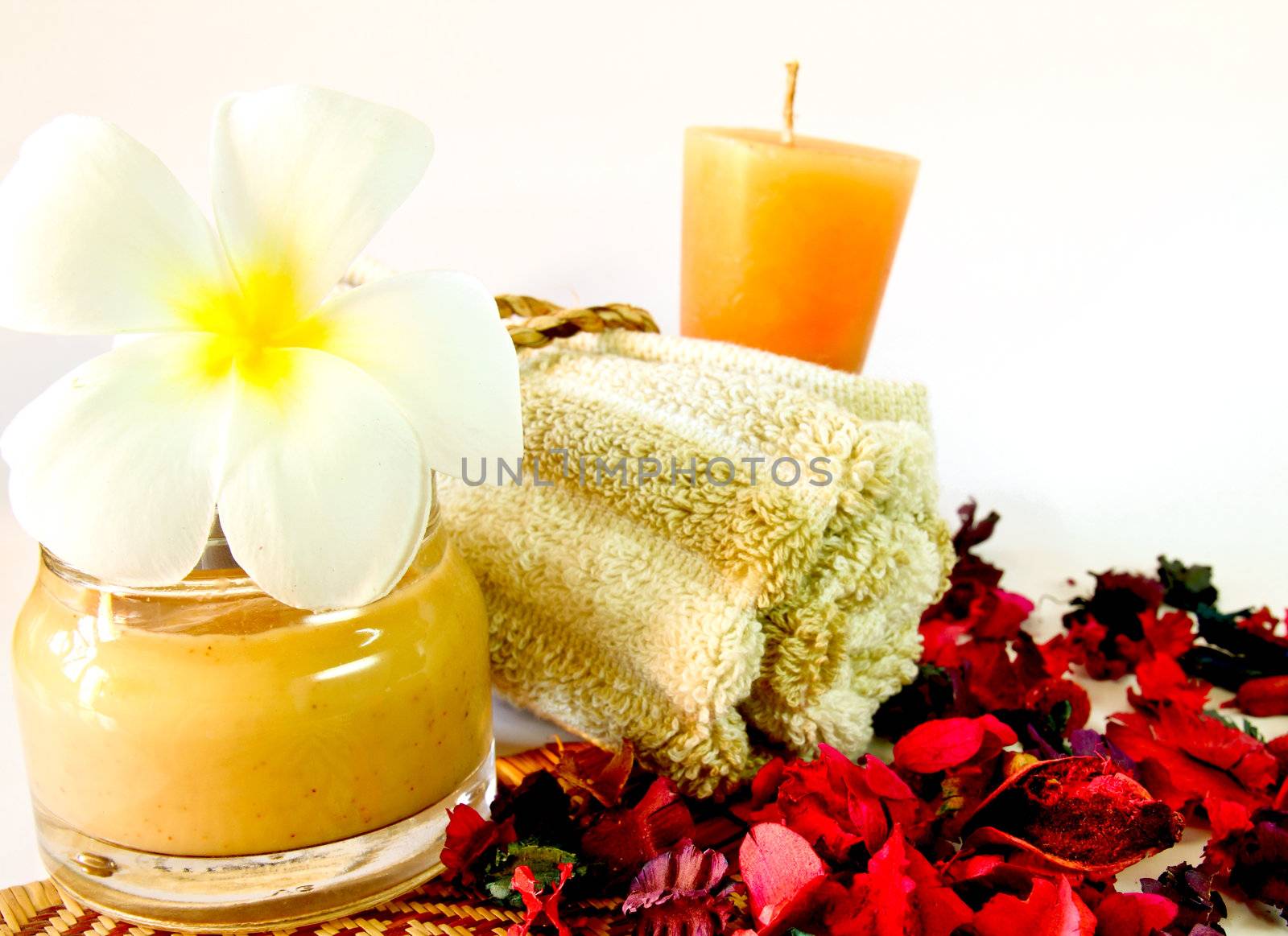 Spa products with flowers and candles