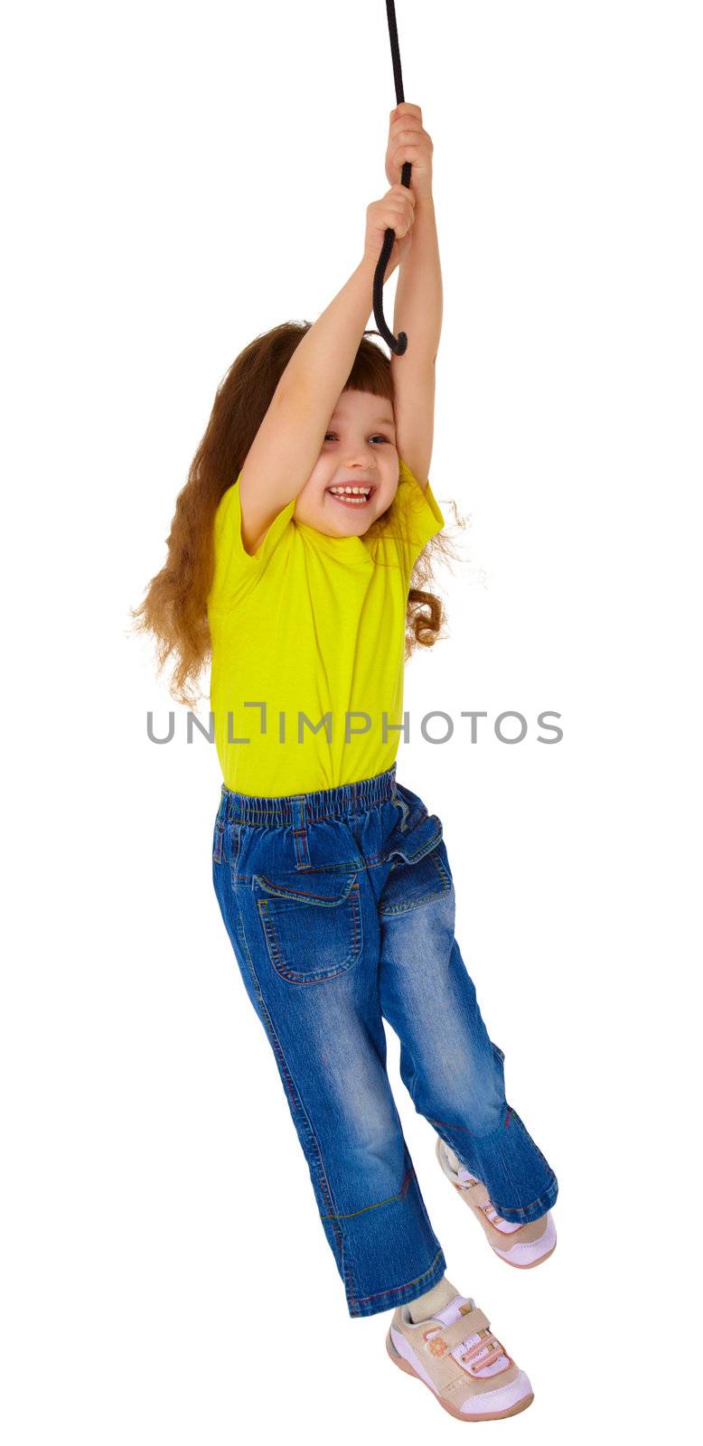 Little girl swinging on a rope isolated on white background