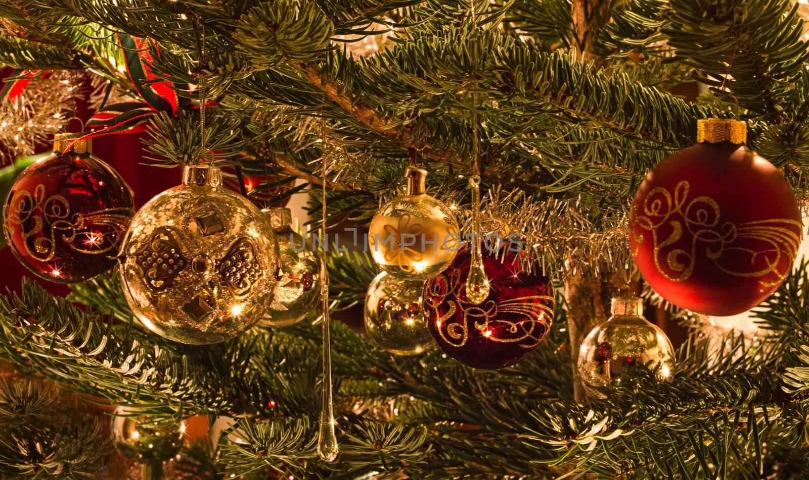 Colorful image of decoration in christmas tree in red, green and silver - horizontal image