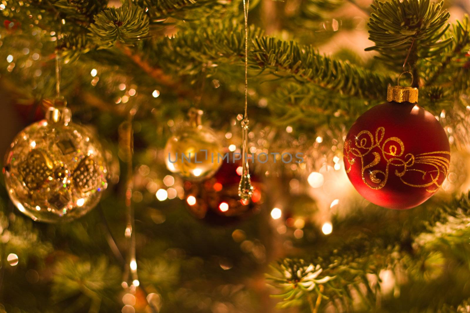 Decoration in christmas tree with balls and lights red and silver - shallow dof