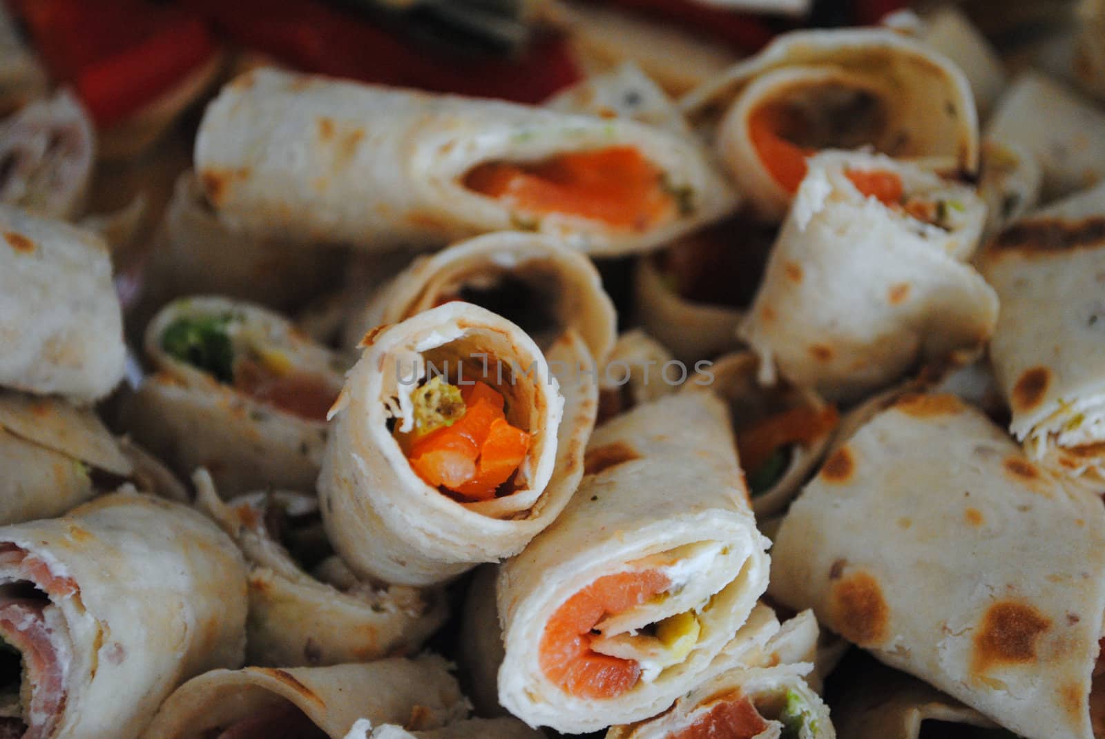 Smoked salmon wrapped in tortilla.