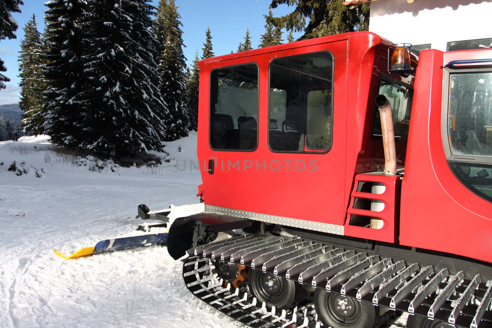 Mountain's red vehicle snowcat close up