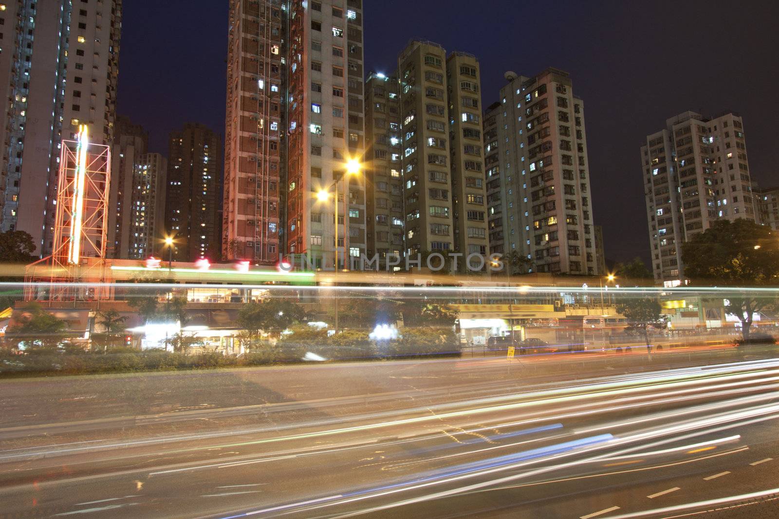 Busy traffic in city at night by kawing921