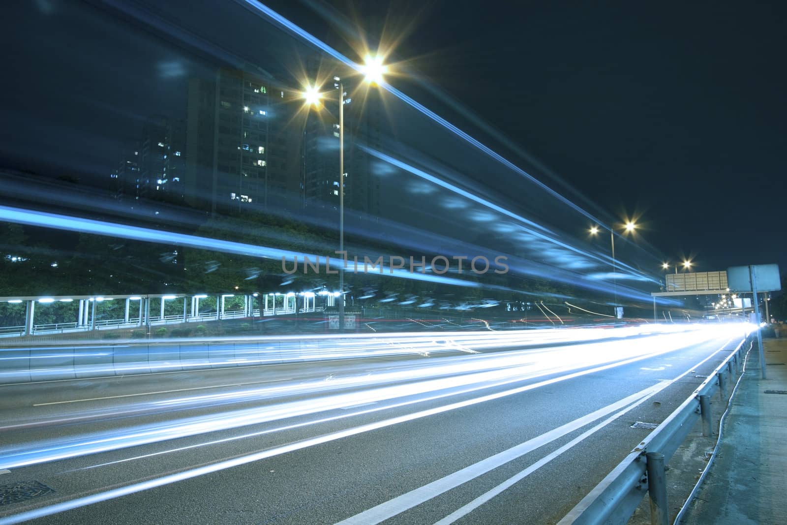 Traffic on highway of Hong Kong at night by kawing921