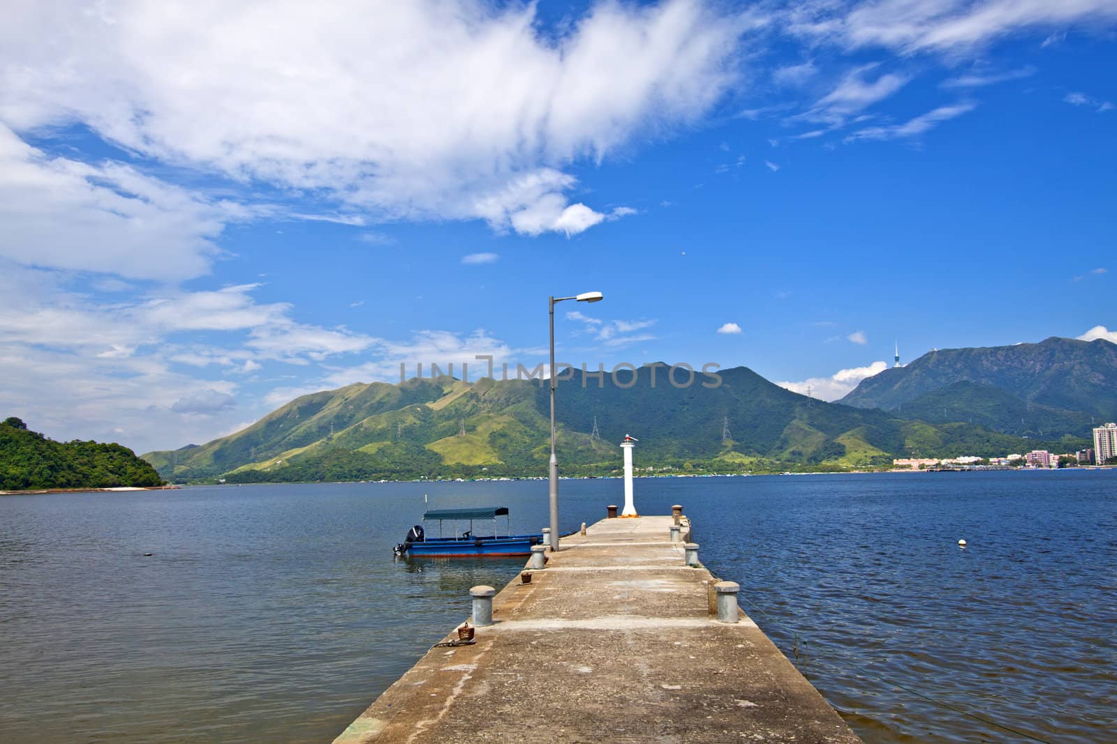 Isolated pier under blue sky