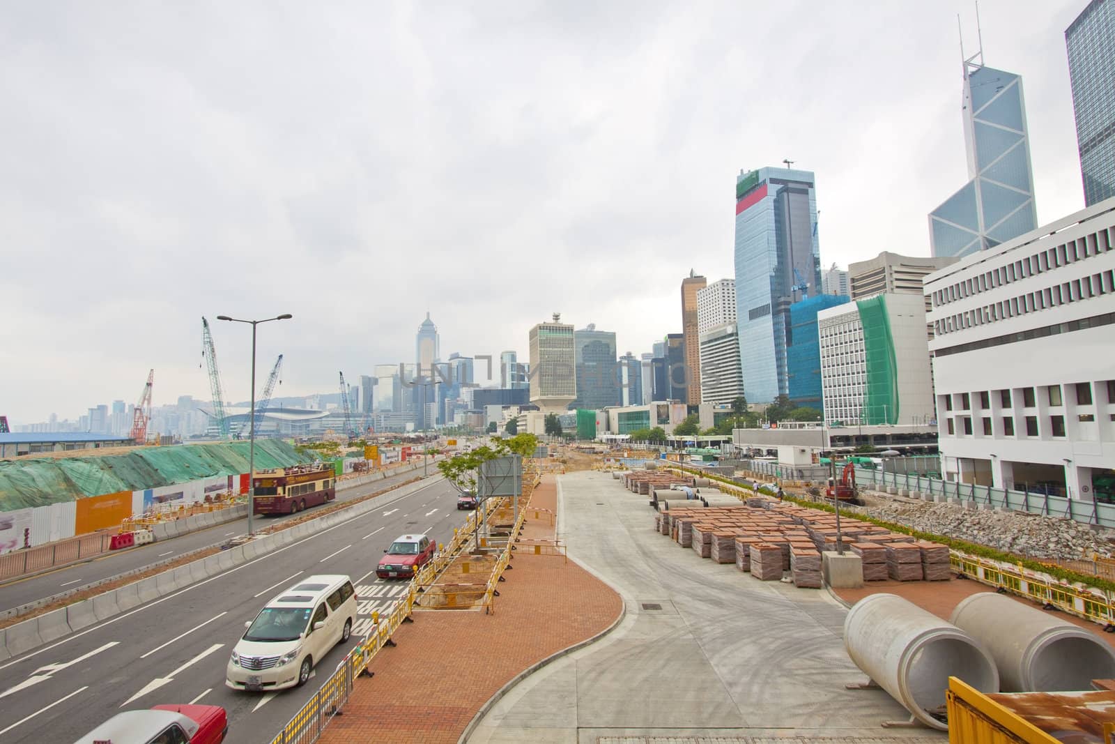 Hong Kong traffic and downtown at day