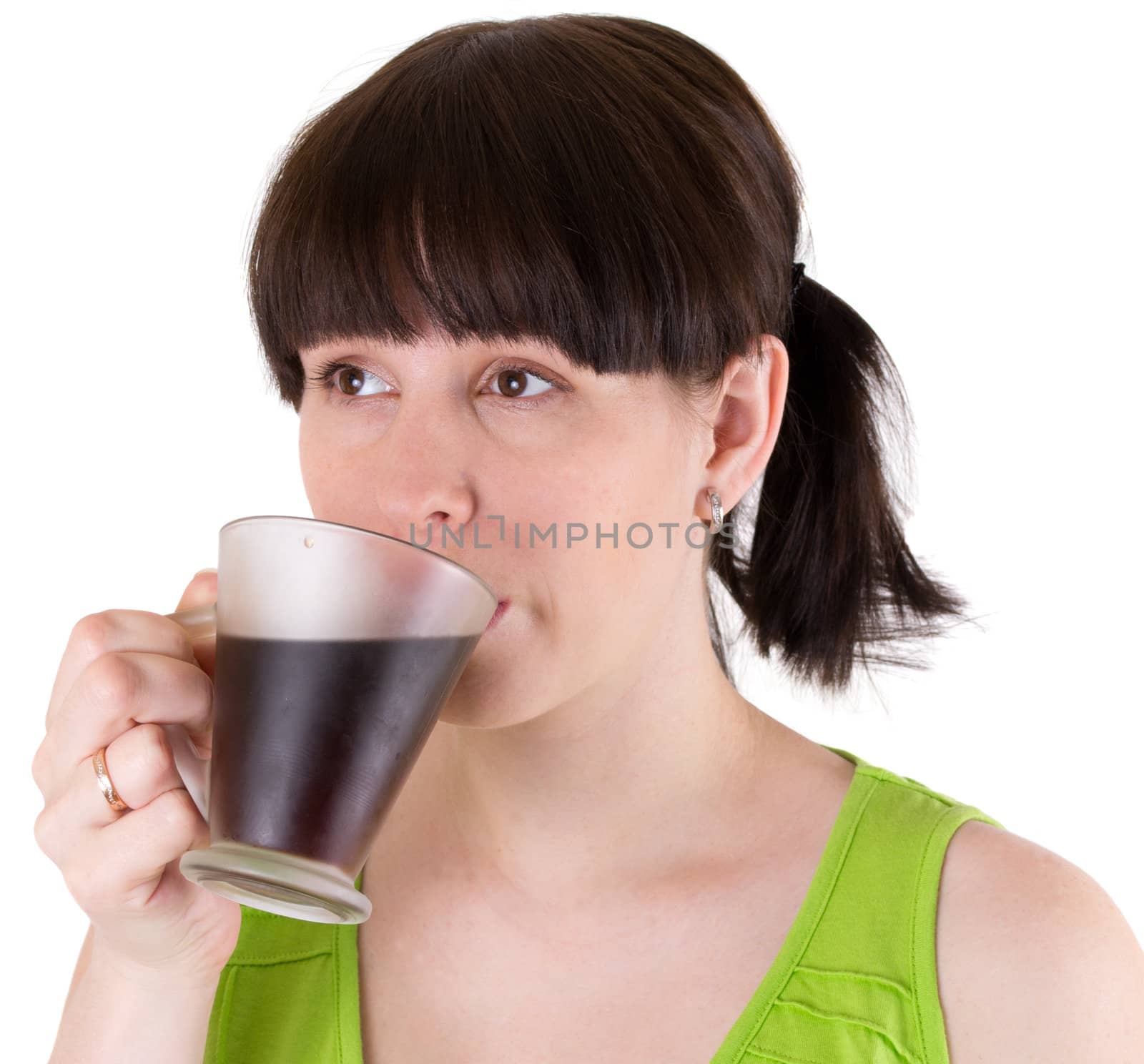 The young woman drinks coffee isolated