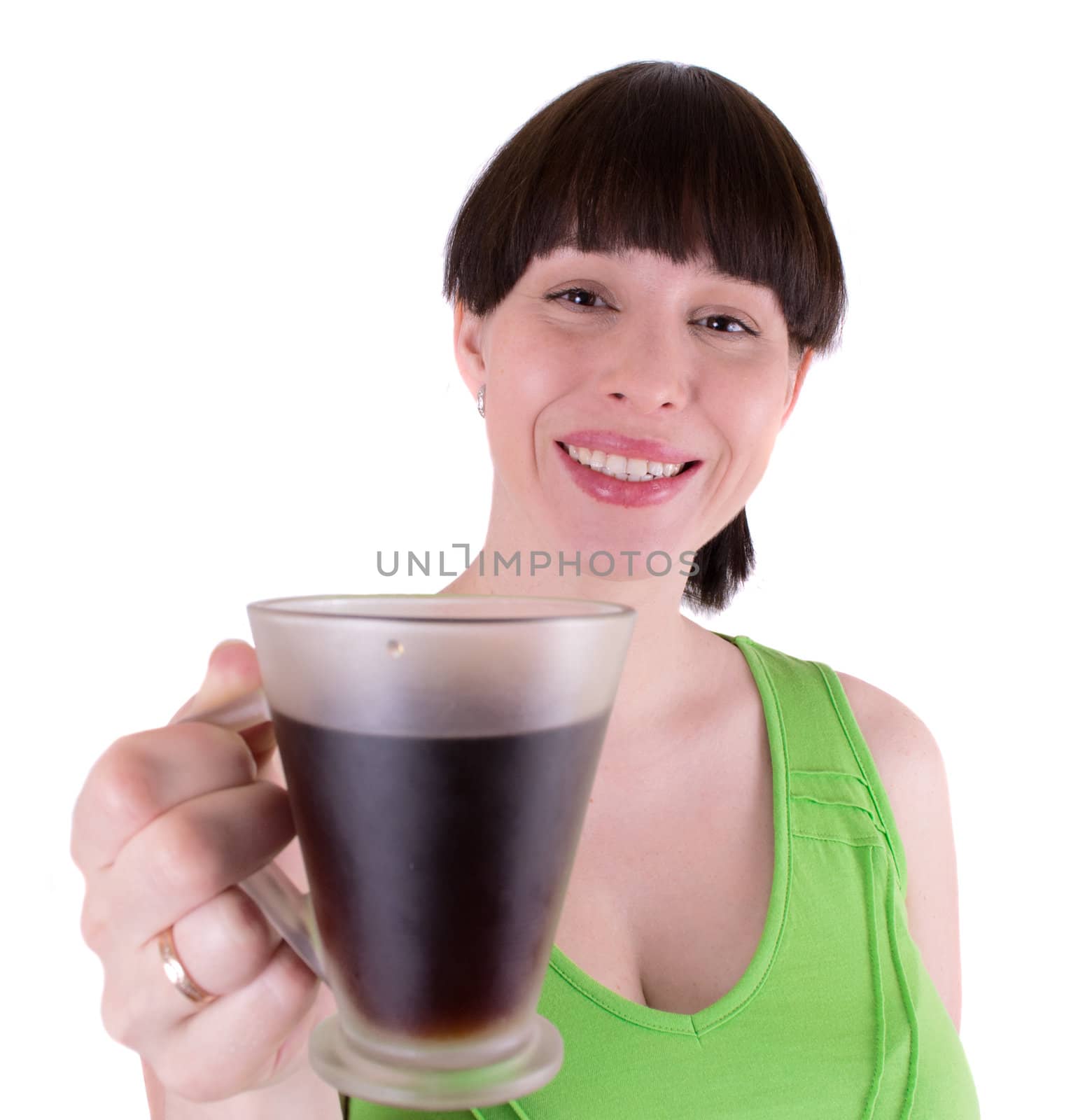 The young joyful woman drinks coffee