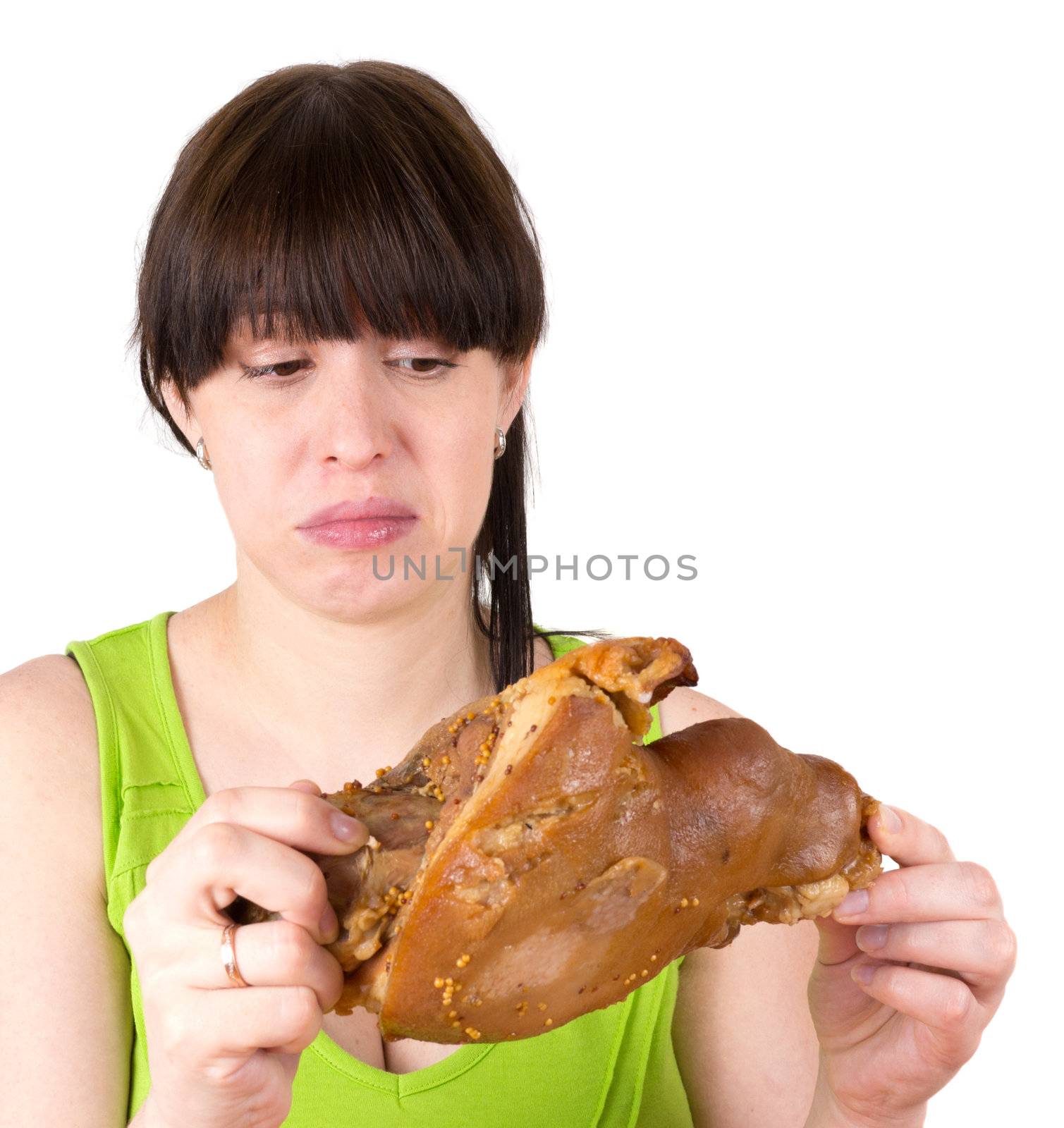 The young woman looks at a meat